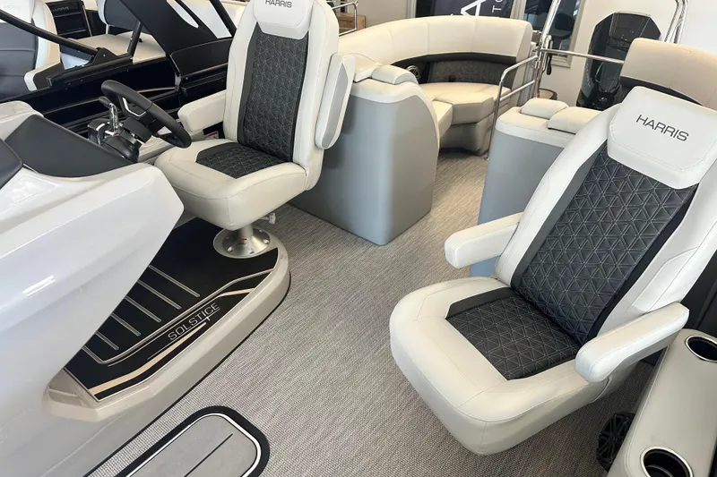 Slide: The Image of Luxurious interior of 2026 Harris Solstice 230 CWDH pontoon boat with plush seating. - 4