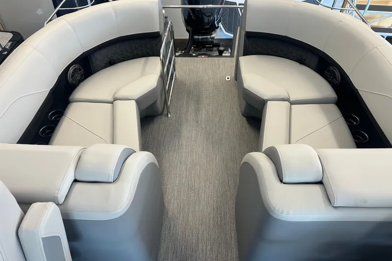 Slide: The Image of Luxurious seating on 2026 Harris Solstice 230 CWDH pontoon boat, featuring elegant gray upholstery. - 5