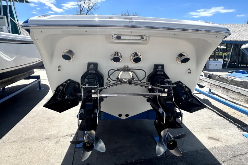 Slide: The Image of 2007 Sunsation 32 Dominator boat stern with dual Mercury outboard engines. - 31