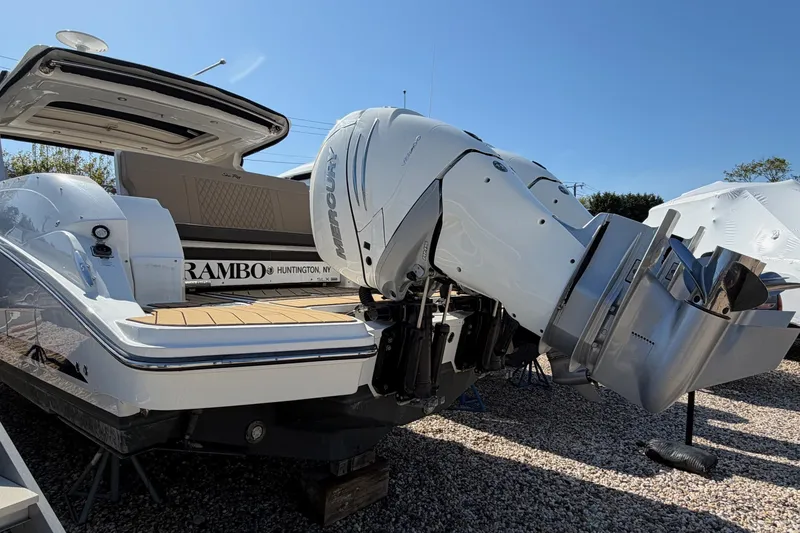 Slide: The Image of 2023 Sea Ray SLX 350 Outboard with Mercury engine, displayed outdoors. - 3
