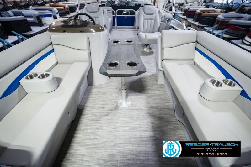 Slide: The Image of Interior of a 2021 Bennington 22 SVSR pontoon boat with seating and table. - 18