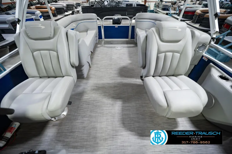 Slide: The Image of 2021 Bennington 22 SVSR pontoon boat interior with plush seating and modern design. - 20