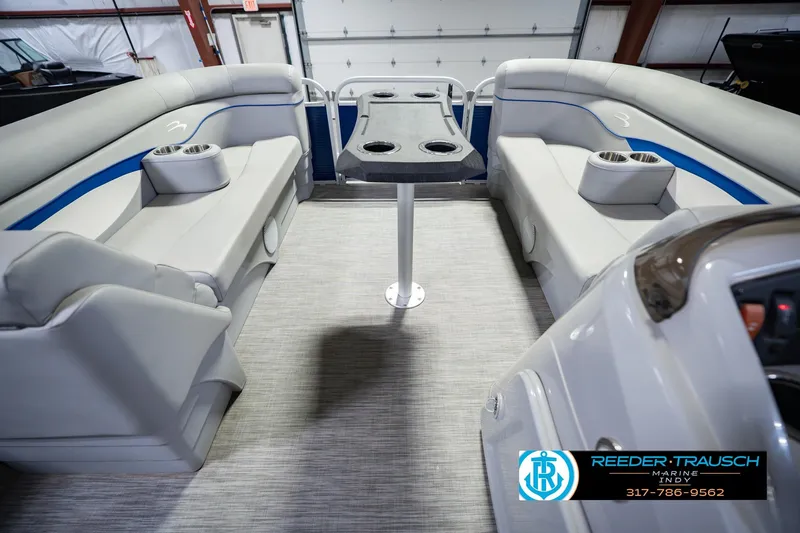 Slide: The Image of Interior of a 2021 Bennington 22 SVSR pontoon boat with seating and table. - 25