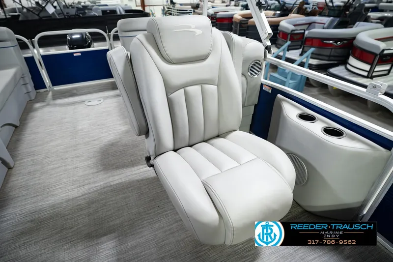 Slide: The Image of Luxurious seating on a 2021 Bennington 22 SVSR pontoon boat, featuring plush upholstery. - 28