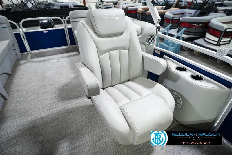 Slide: The Image of Luxurious seating on a 2021 Bennington 22 SVSR pontoon boat, featuring plush upholstery. - 29