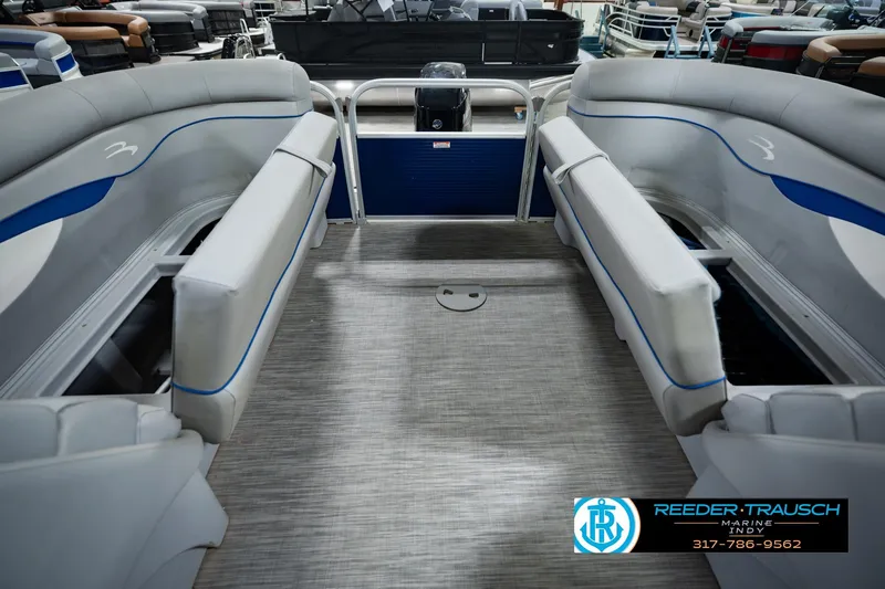 Slide: The Image of Interior view of a 2021 Bennington 22 SVSR pontoon boat with gray seating. - 32