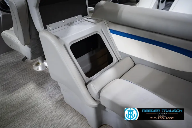 Slide: The Image of Interior of a 2021 Bennington 22 SVSR boat showing seating and storage compartment. - 34
