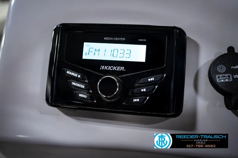 Slide: The Image of Kicker media center on 2021 Bennington 22 SVSR displaying FM 110.3. - 38