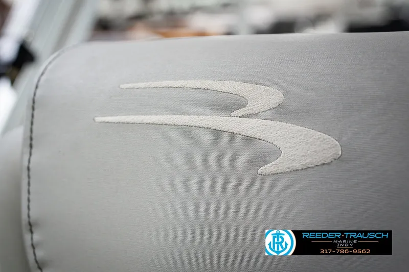 Slide: The Image of Gray upholstery with Bennington logo on 2021 22 SVSR boat seat. - 47