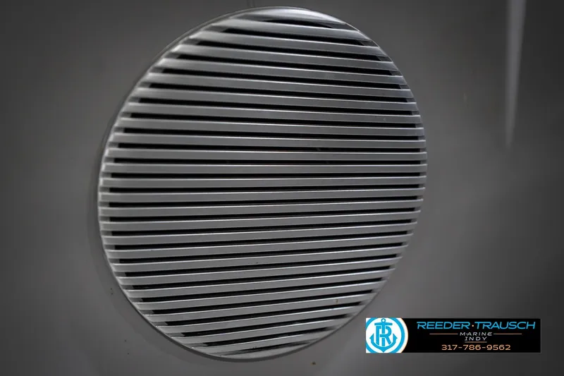 Slide: The Image of Speaker grille on a 2021 Bennington 22 SVSR boat, Reeder Trausch Marine logo visible. - 51