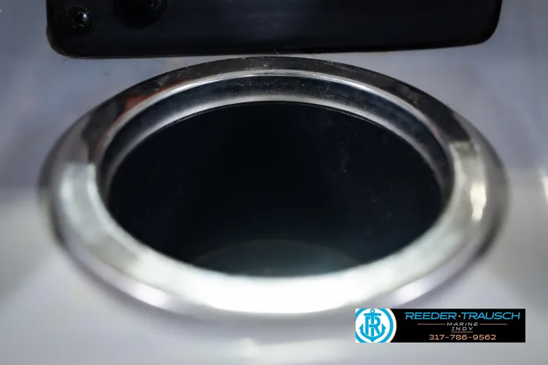 Slide: The Image of Close-up of a cup holder on a 2021 Bennington 22 SVSR boat. - 52