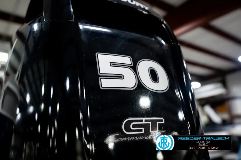 Slide: The Image of Close-up of a 2021 Bennington 22 SVSR boat engine with "50 CT Command" label. - 56