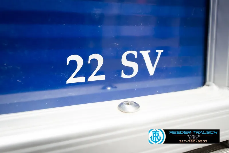 Slide: The Image of Close-up of 2021 Bennington 22 SVSR boat model number on blue surface. - 60
