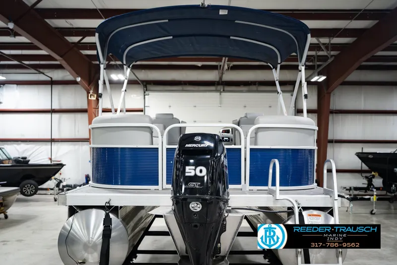 Slide: The Image of 2021 Bennington 22 SVSR pontoon boat with Mercury 50 engine in showroom. - 9