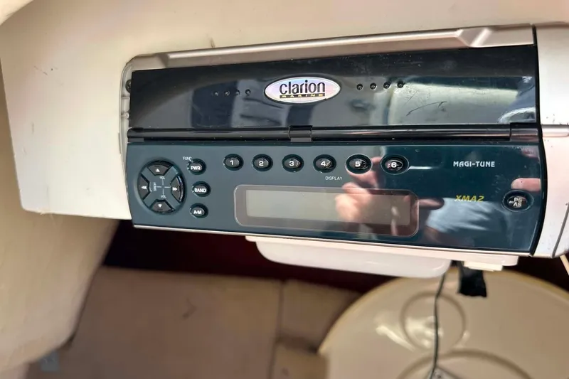 Slide: The Image of Clarion marine stereo system in a 2001 Sea Ray 260 Bow Rider boat. - 20