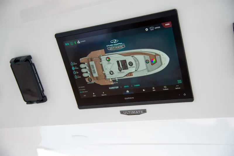 Slide: The Image of Touchscreen control panel on 2026 Regal 43 SAV boat dashboard. - 17