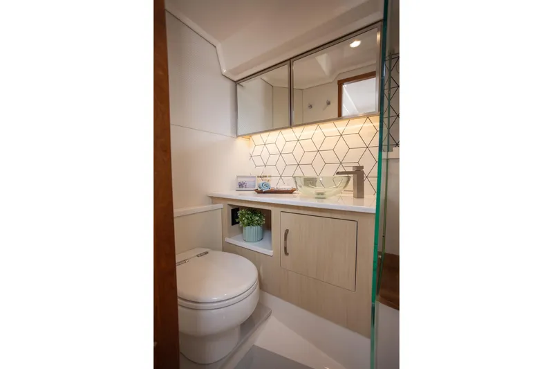 Slide: The Image of Modern bathroom in 2026 Regal 43 SAV yacht with geometric tiles and sleek fixtures. - 25