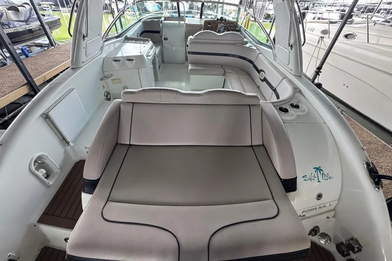 Slide: The Image of 2008 Formula 350 Sun Sport boat interior with seating and helm. - 10
