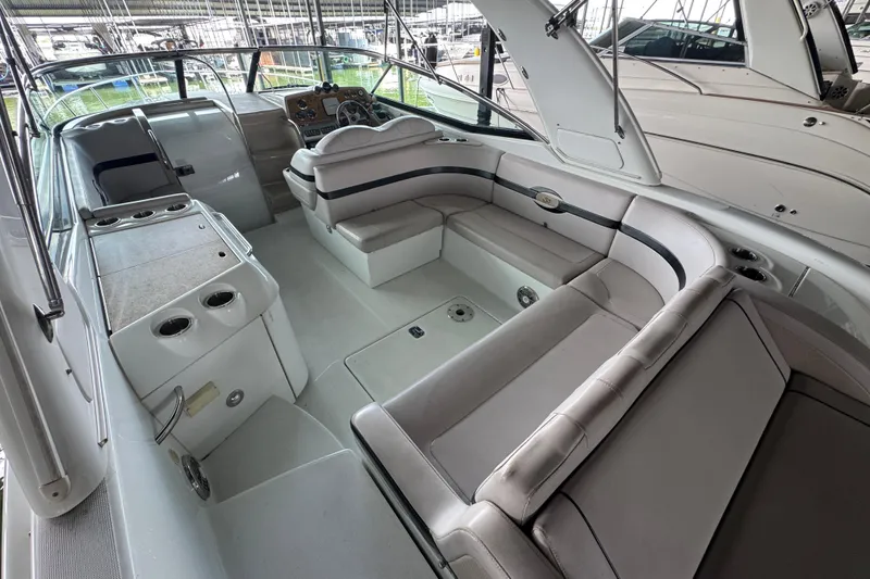 Slide: The Image of 2008 Formula 350 Sun Sport boat interior with seating and helm. - 11