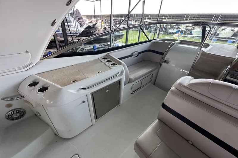 Slide: The Image of 2008 Formula 350 Sun Sport boat interior with seating and storage compartments. - 12