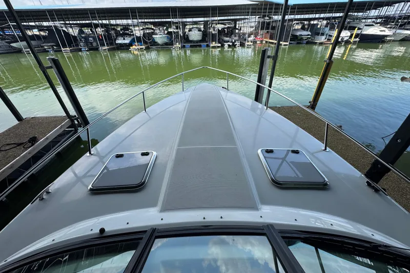 Slide: The Image of 2008 Formula 350 Sun Sport boat docked at marina, view from bow. - 15