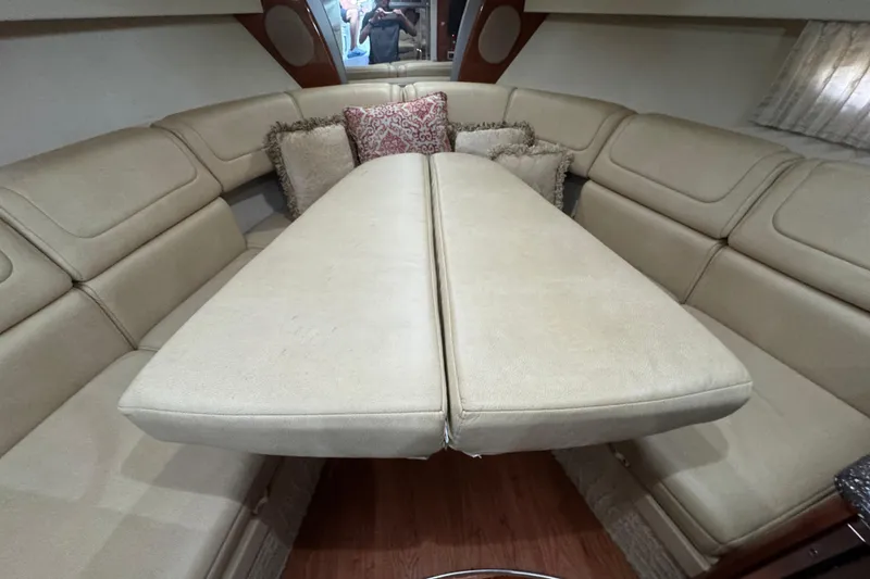 Slide: The Image of Interior of 2008 Formula 350 Sun Sport with beige seating and decorative pillows. - 18