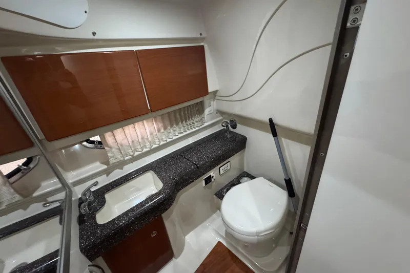 Slide: The Image of Interior of 2008 Formula 350 Sun Sport boat bathroom with sink and toilet. - 23