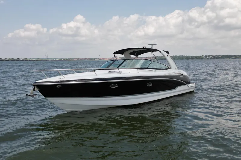Slide: The Image of 2008 Formula 350 Sun Sport boat on open water under cloudy sky. - 7
