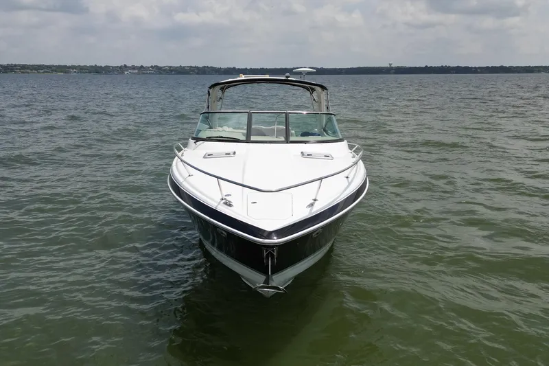 Slide: The Image of 2008 Formula 350 Sun Sport boat on calm water under cloudy sky. - 8