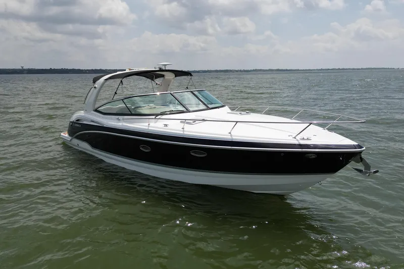 Slide: The Image of 2008 Formula 350 Sun Sport boat on calm water under cloudy sky. - 9