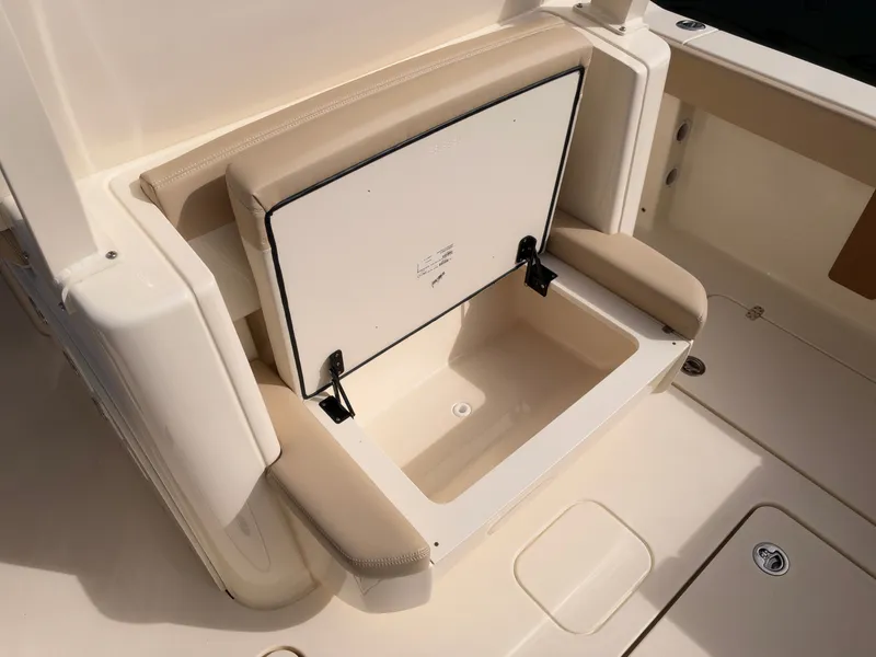 Slide: The Image of The 2027 Scout 330 LXF features an open bench seat with storage underneath. - 15