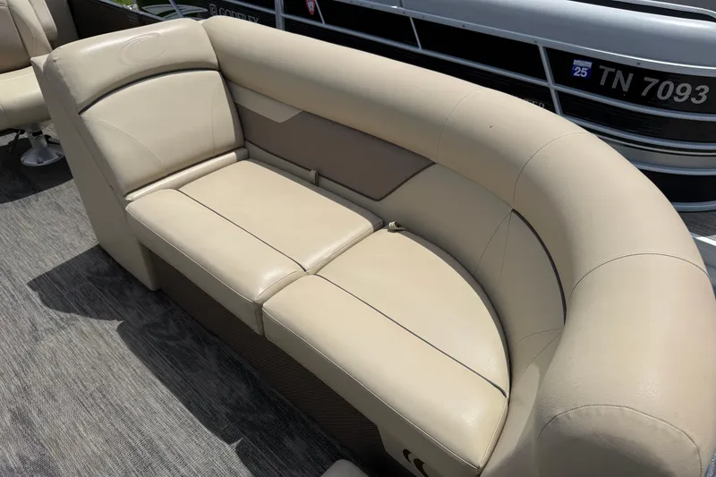 Slide: The Image of Beige seating on 2022 Crest Classic LX 220 pontoon boat, showcasing comfort and style. - 12