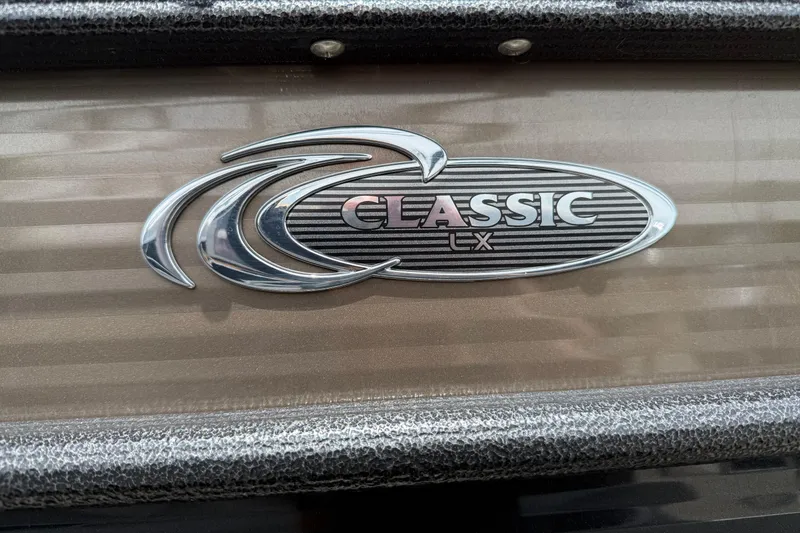 Slide: The Image of 2022 Crest Classic LX 220 emblem on textured surface. - 3