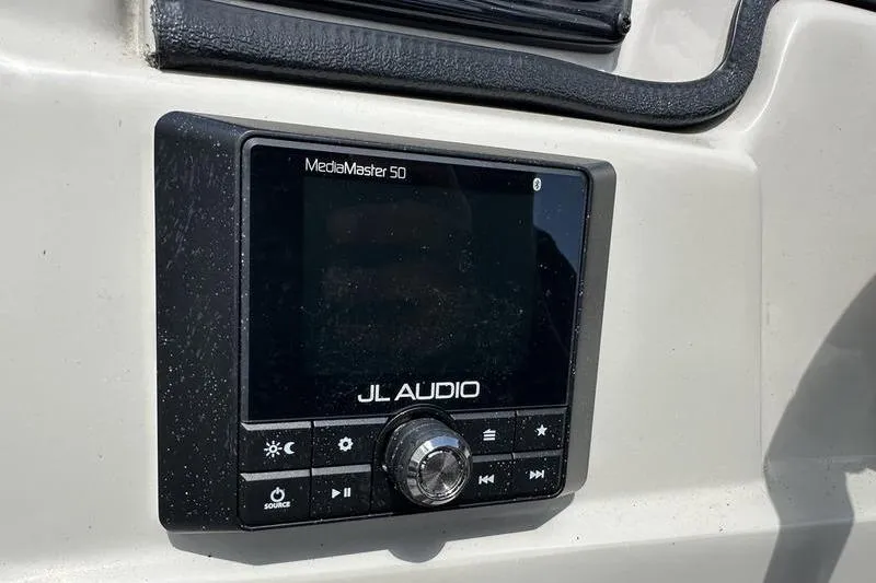 Slide: The Image of JL Audio MediaMaster 50 installed on 2022 Starcraft SLS 3 boat dashboard. - 20
