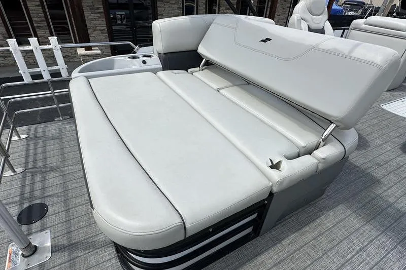 Slide: The Image of 2022 Starcraft SLS 3 boat interior with gray cushioned seating and sleek design. - 24