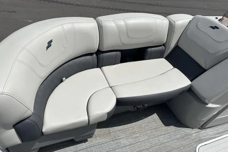 Slide: The Image of 2022 Starcraft SLS 3 boat interior with plush white seating and modern design. - 4