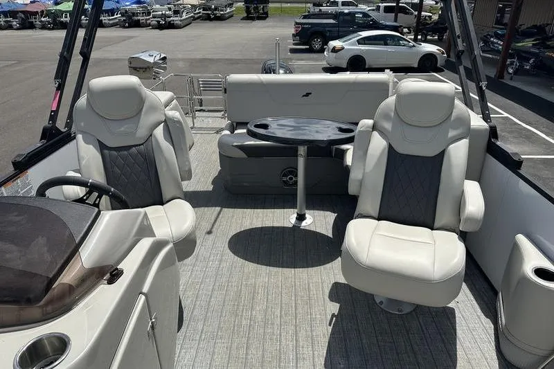 Slide: The Image of Interior of 2022 Starcraft SLS 3 boat with plush seating and table. - 9
