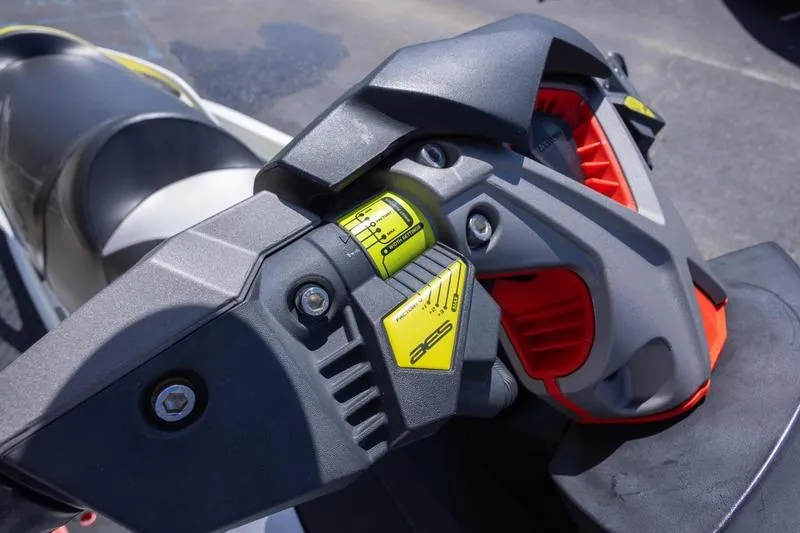 Slide: The Image of Close-up of 2016 Sea Doo RXT 300 handlebar controls with vibrant accents. - 9