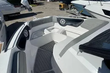 Slide: The Image of 2025 NX Boats NX280 XTREME interior, featuring sleek seating and modern design elements. - 11