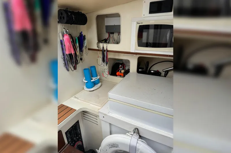 Slide: The Image of Interior of 2006 Luhrs 28 Open boat with fishing gear and equipment. - 16