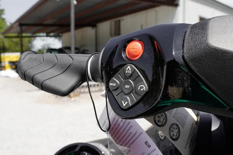 Slide: The Image of Close-up of 2026 Sea-Doo GTI SE 130 handlebar controls with buttons and grip. - 8