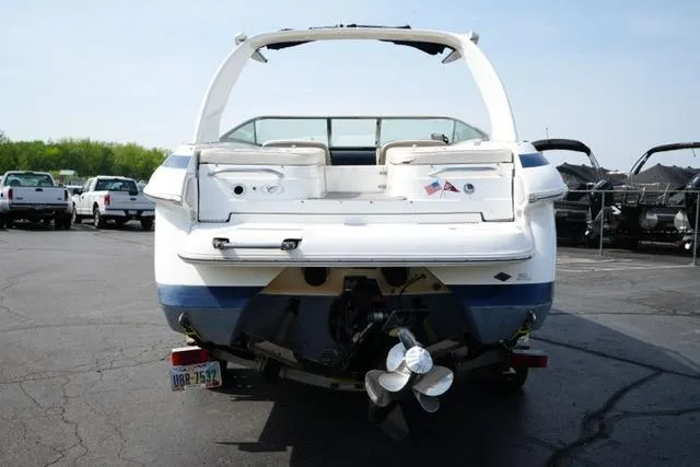 Slide: The Image of Rear view of a 2002 Cobalt 263 boat in a parking lot. - 6