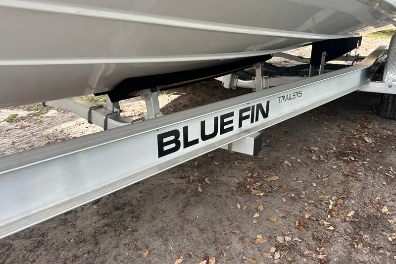 Slide: The Image of Trailer for 2024 Aquasport 230 Pro Bay boat by Blue Fin. - 24