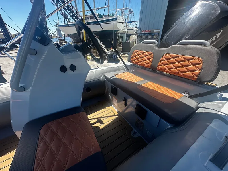 Slide: The Image of Interior of 2021 Highfield Sport 360 boat with stylish seating. - 10