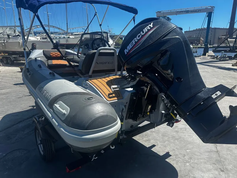 Slide: The Image of 2021 Highfield Sport 360 boat with Mercury outboard motor at the harbor. - 5