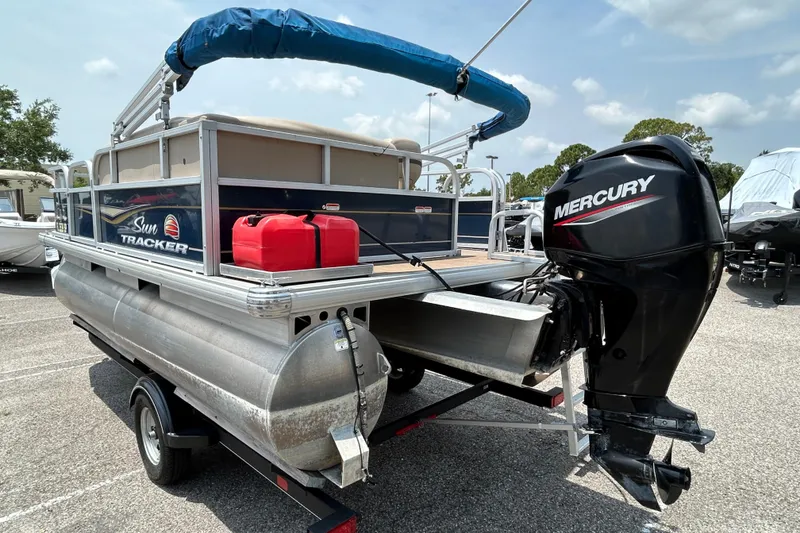 Slide: The Image of 2020 Sun Tracker Bass Buggy 16 DLX pontoon boat with Mercury outboard motor. - 3