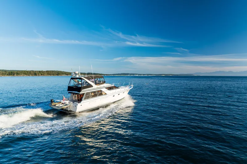 Slide: The Image of Ocean Alexander 48 Sedan yacht cruising on open water, 1990 model. - 5