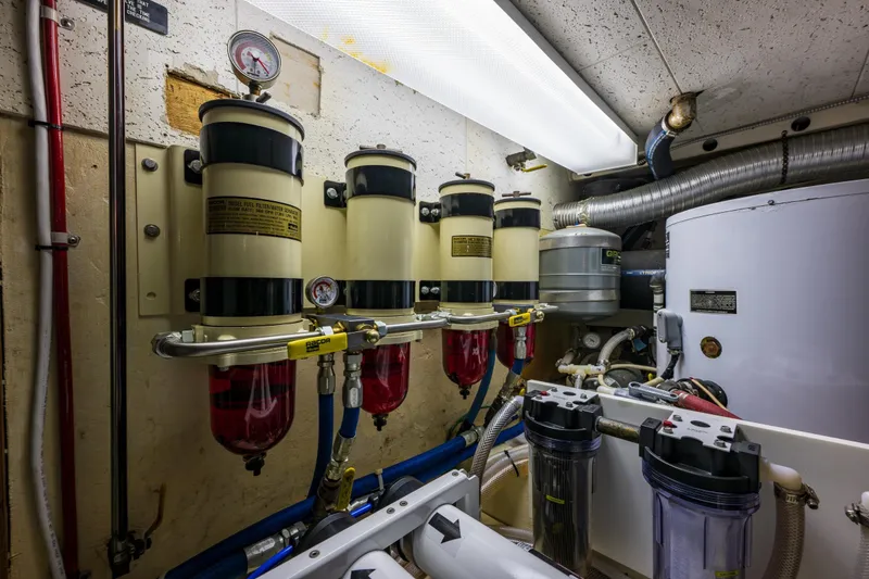 Slide: The Image of Engine room of 1990 Ocean Alexander 48 Sedan with fuel filtration system. - 53