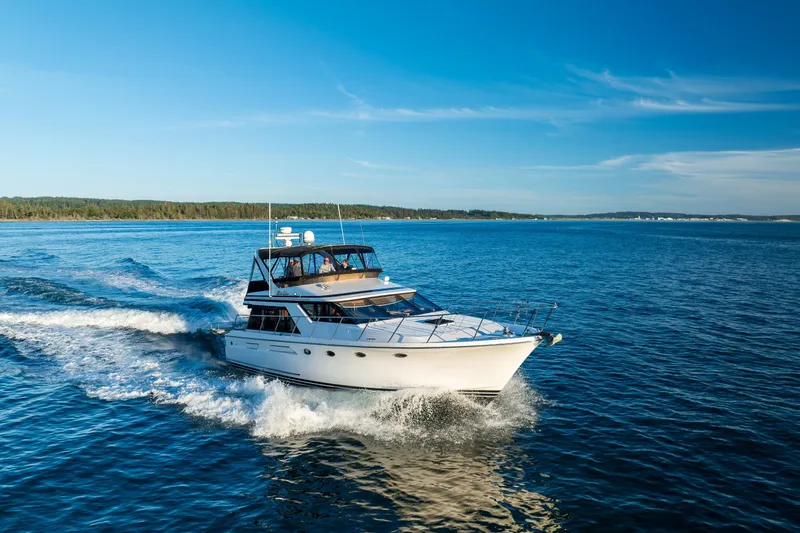 Slide: The Image of Ocean Alexander 48 Sedan yacht cruising on open water, 1990 model. - 6