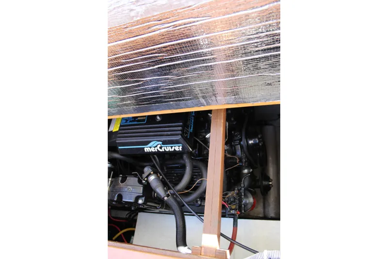 Slide: The Image of Engine compartment of 1990 Carver 3207 Aft Cabin Motor Yacht with MerCruiser engine. - 27